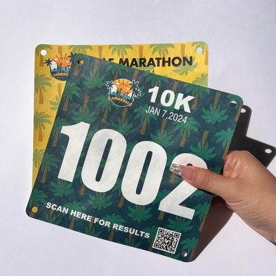 Atletismo Placa de tecido Atleta de maratona Número de corrida Livro Número de corrida Número de tecido Adesivo digital